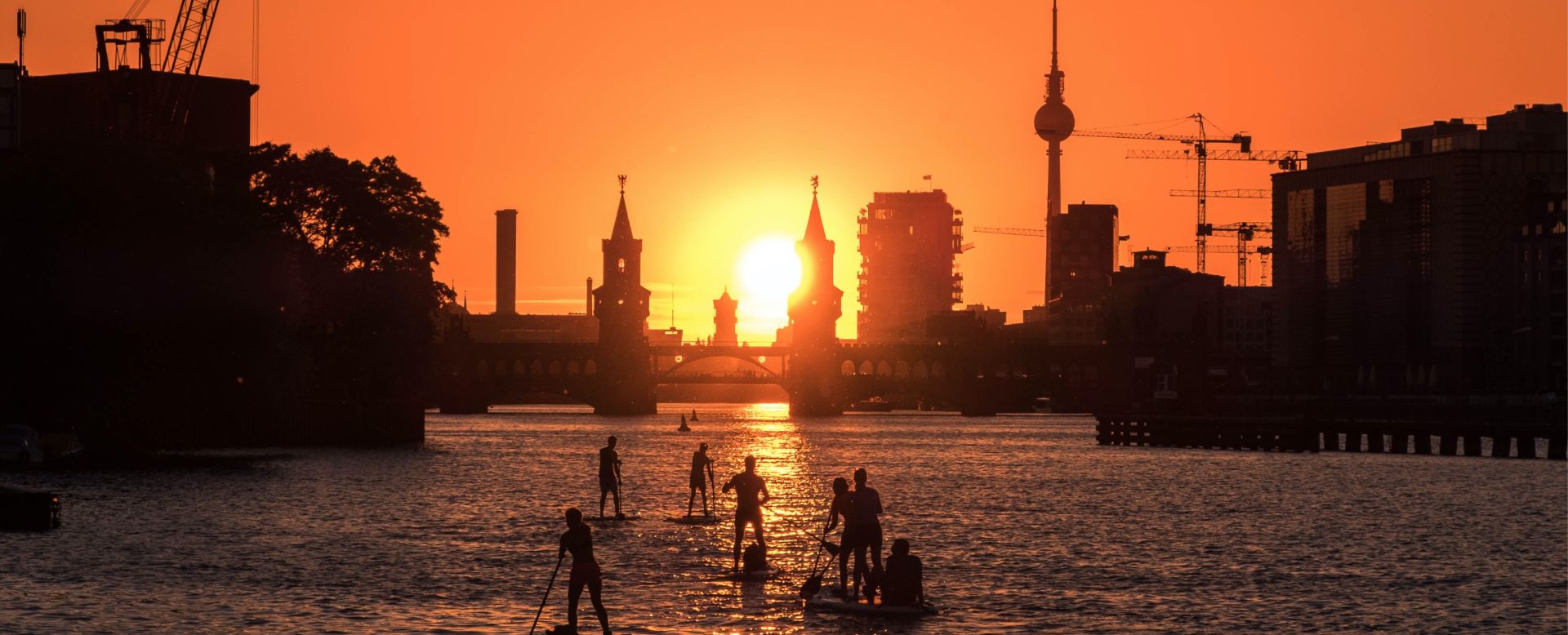 image of paddle surfers on the River Spree