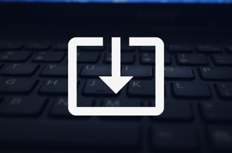 download symbol placed above a keyboard