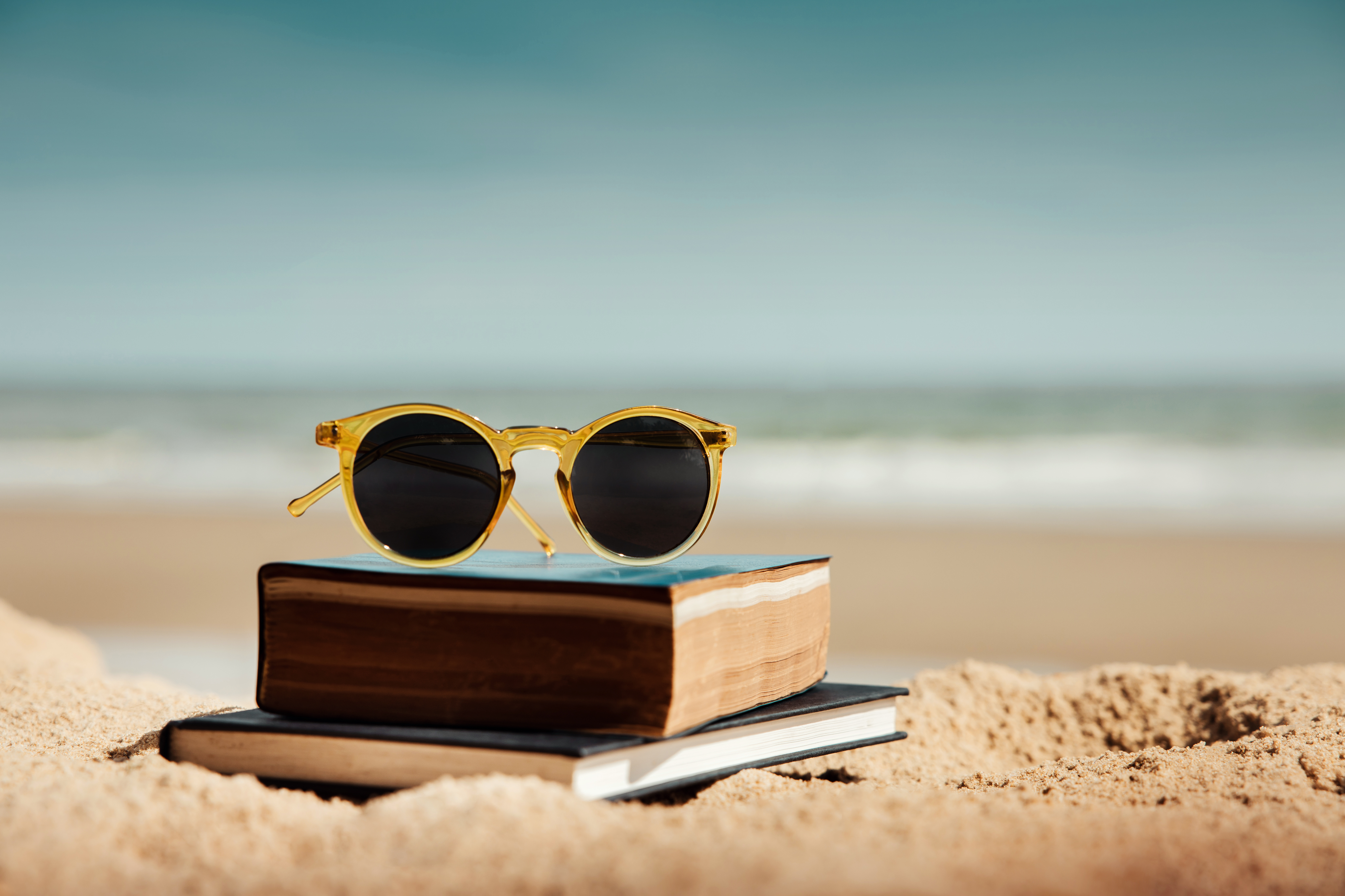Book beach sunglasses