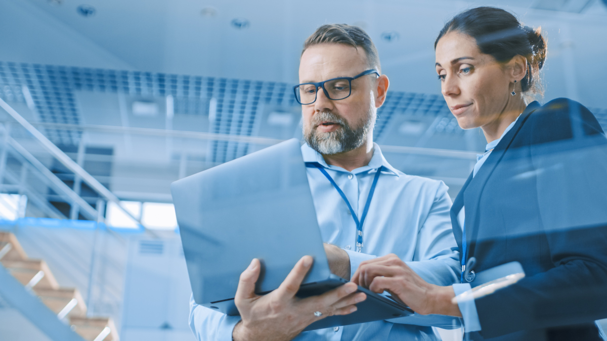 Businesswoman and Businessman Working on a AI Project