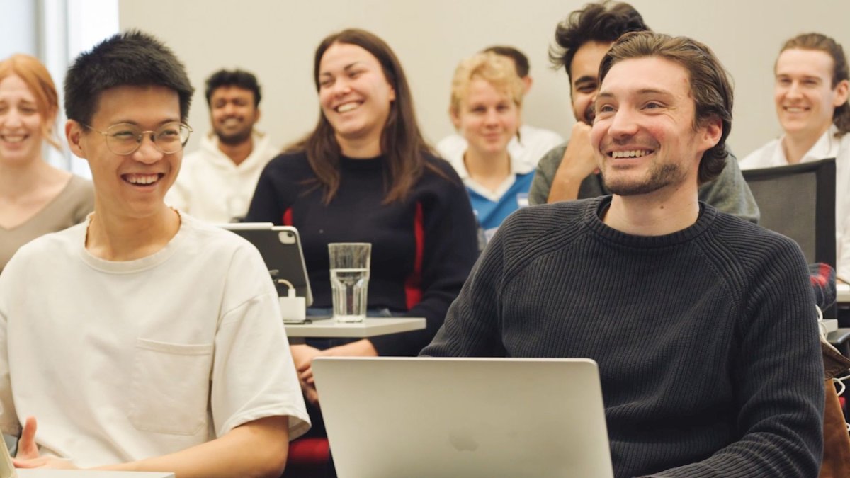 ESMT Berlin Master in Analytics and Artificial Intelligence student Jean-Christophe Scheider sitting in a class with his cohort