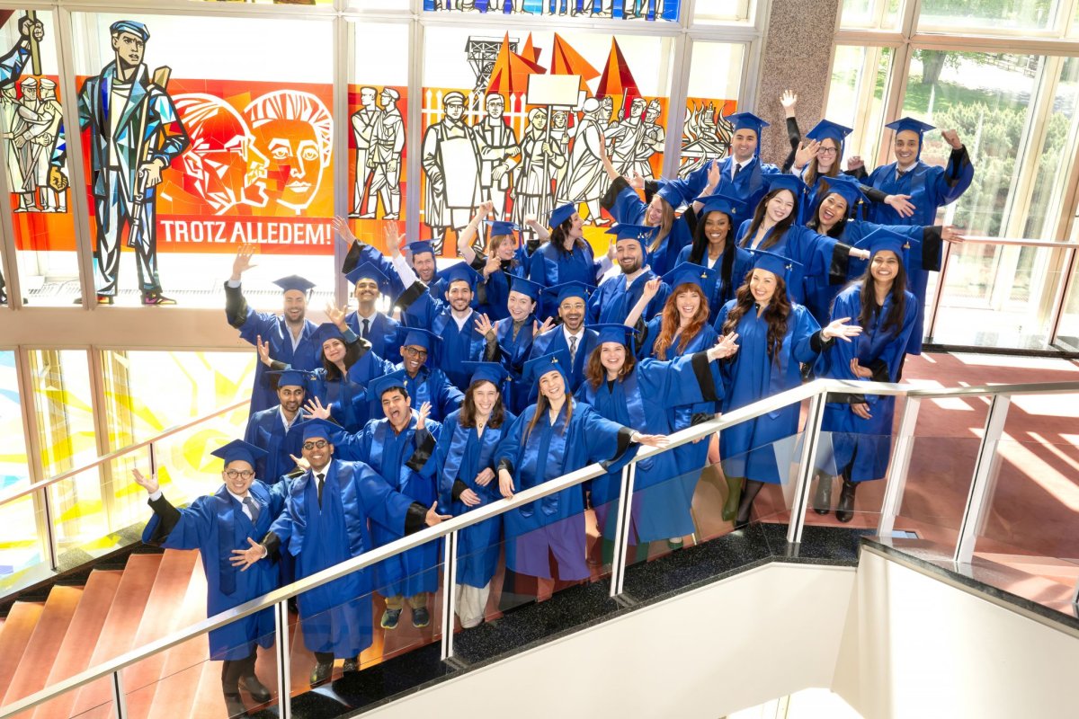 The ESMT Full-time MBA graduating class of 2026 in their blue graduation gowns