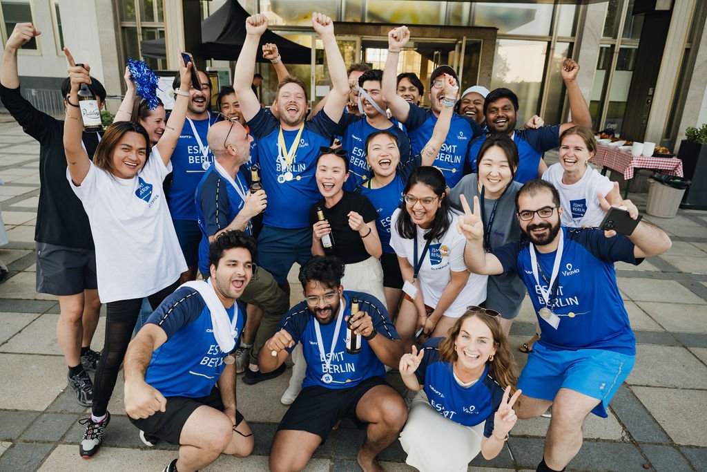 ESMT Berlin Full-time MBA students celebrating after winning medals at the ESMT Olympics