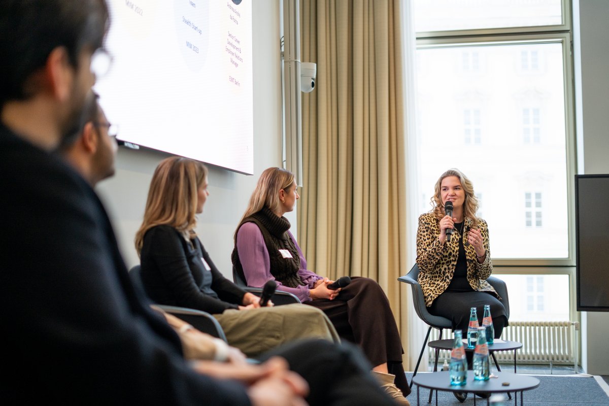Andreza André da Rocha, Senior Career Development & Employer Relations Manager at ESMT Berlin and guests having a panel discussion on stage during the ESMT Career Fair