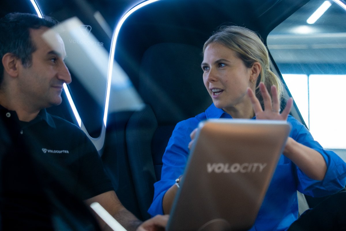 Image of ESMT Berlin Full-time MBA alum Marie Masson, on the job in an aircraft in her role of Head of Sales and Marketing at Volocopter