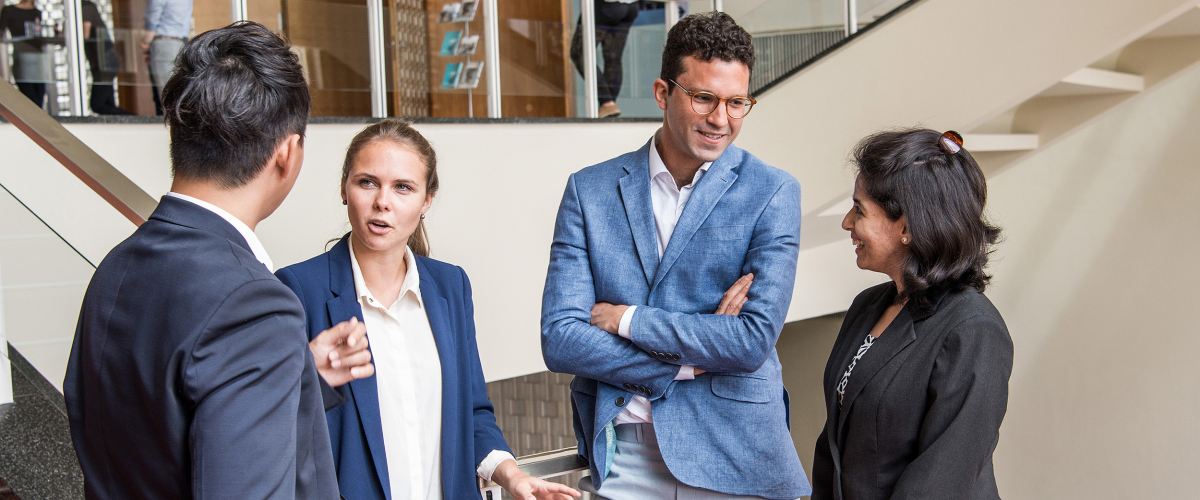 MBA students on the stairs at ESMT Berlin