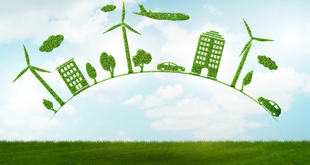 green grass with green windmills, car, buildings,