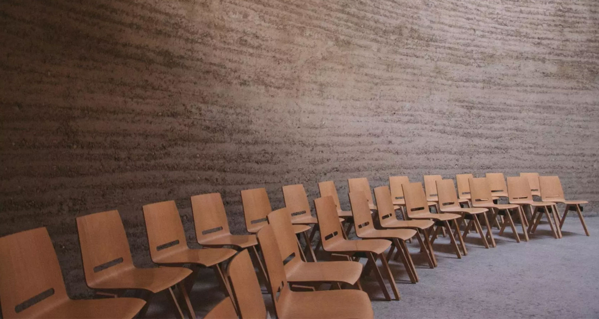 brown seminar chairs in a large room