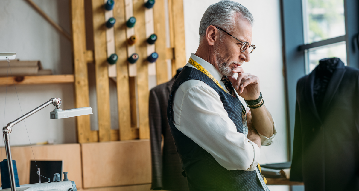 Male tailor looking pensive