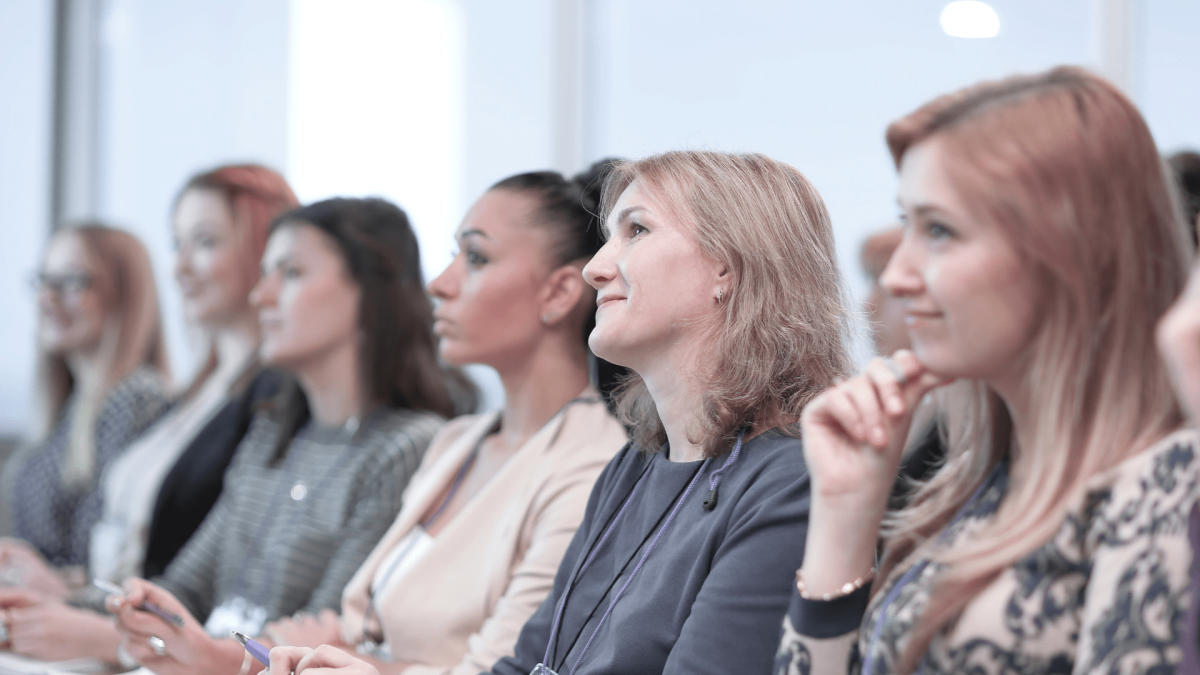 Women listening to panel discussion