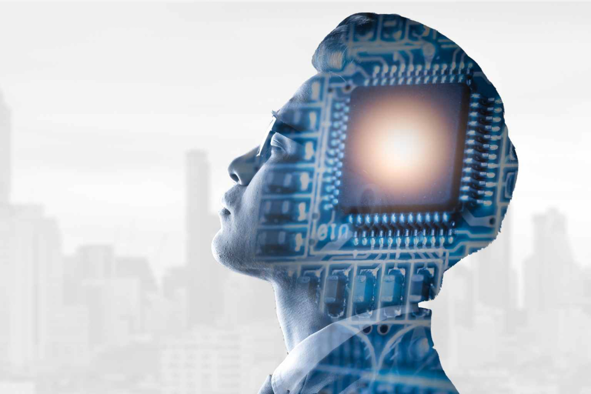 AI concept of person in silhouette overlayed with electric circuit