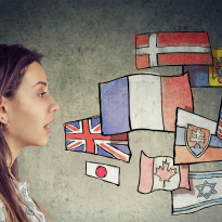Young student woman learning different languages - flying flags