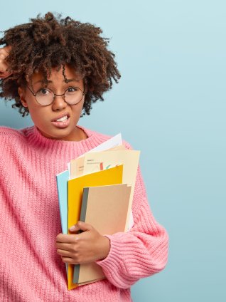 student scratching head