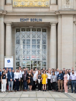 Chika Ananaba and the Global Online MBA class of 2025 outside the ESMT Berlin building