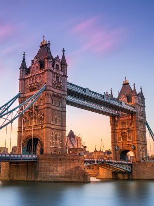 Tower Bridge in London with a view of the Gherkin in the background