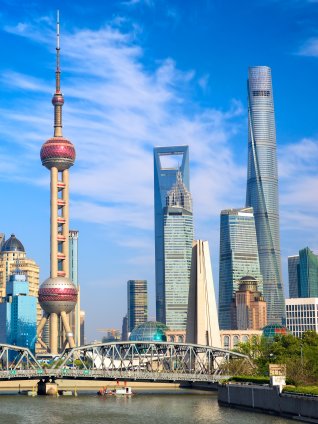 Image of the iconic skyline of the Lujiazui financial district in Shanghai, China, showing the Oriental Pearl Tower