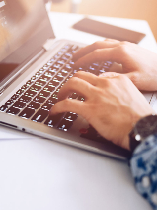 Global Online MBA student checking curriculum