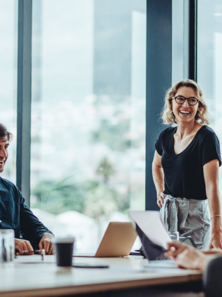 Business people having casual discussion during meeting