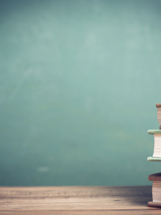 DIPVAR Publications image: Books on a table