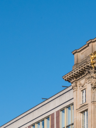 A picture of the front side of ESMT campus building.