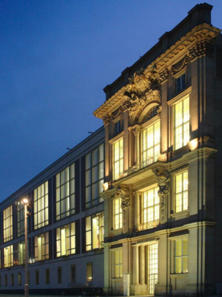 This is a photo of the front exterior of ESMT Berlin's main building.