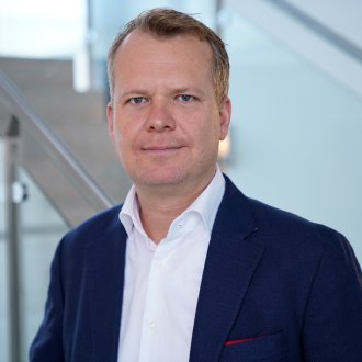 Portrait image of Till Föste, Postgraduate Diploma in Management alum