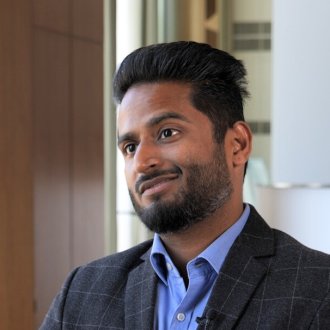 ESMT Full-time MBA alum Prateek Bharadwaj speaking to the camera