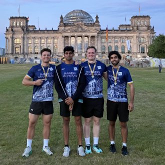  ESMT Berlin master's student Fynn Barkhausen and other members of the school running club in front of the Berliner Dom