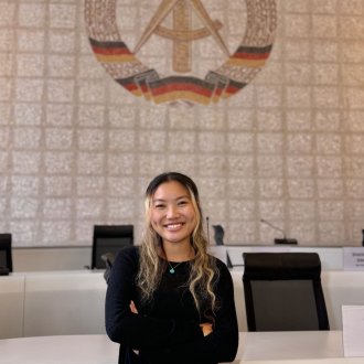 ESMT Berlin Full-time MBA student Ting Han in a lecture hall on campus