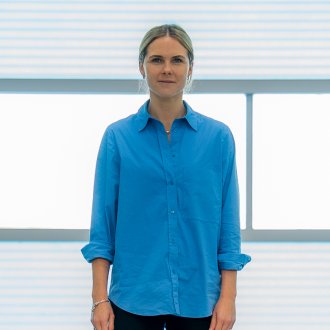 Portrait of ESMT Berlin Full-time MBA alum Marie Masson, Head of Sales and Marketing at Volocopter
