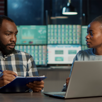 Man and woman doing teamwork to develop new trade sales Man and woman doing teamwork to develop new trade sales 