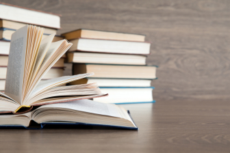 Book on wooden shelf