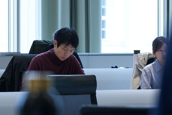 Shangyuan Chen sitting in class 