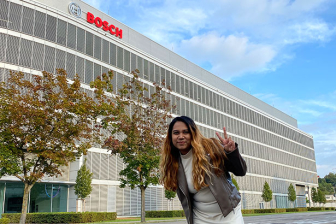Radhika Rajvanshi standing outside Bosch building
