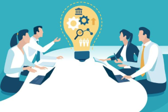 People working on ideas around a table