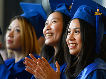 happy students at graduation