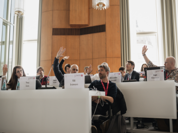 People raising their hands