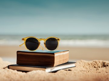 Book beach sunglasses