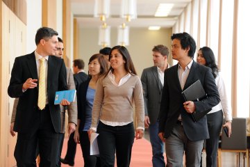 mba students talking while walking