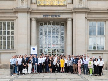 Chika Ananaba and the Global Online MBA class of 2025 outside the ESMT Berlin building