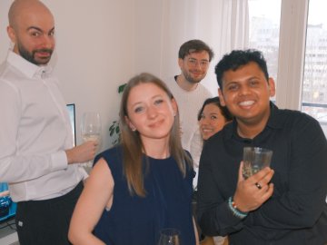 ESMT Berlin Master's student Alexander Berner and friends at a class party