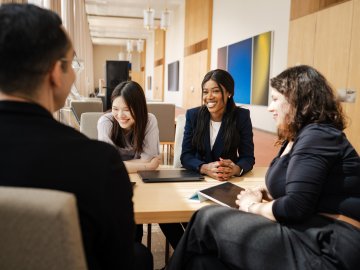 ESMT Berlin Full-time MBA student Gloria Motopu and classmates studying together on campus