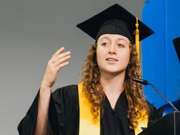 ESMT Master in Global Management student Elise Most making a speech on stage at graduation