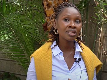 A participant in the Social Impact Project from ESMT speaking to the camera