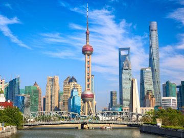 Image of the iconic skyline of the Lujiazui financial district in Shanghai, China, showing the Oriental Pearl Tower