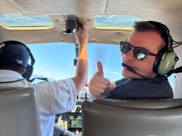ESMT Berlin Part-time MBA student Tim Krewerth flying a plane