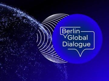 Berlin Global Dialogue logo on blue circle with abstract dotted globe