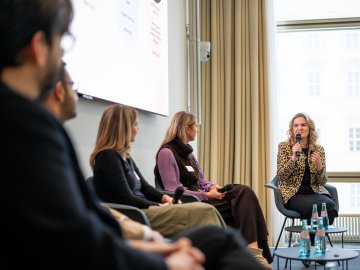 Andreza André da Rocha, Senior Career Development & Employer Relations Manager at ESMT Berlin and guests having a panel discussion on stage during the ESMT Career Fair