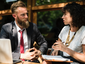 two people speaking