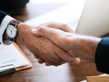 Two people shaking hands